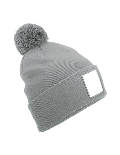 Berretto con patch pom applicato